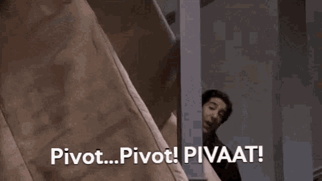 Ross from Friends shouting 'Pivot! Pivot! Pivot!' while trying to carry a couch up a narrow staircase